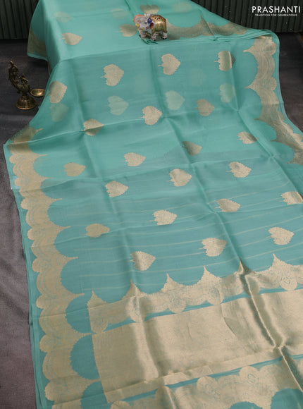 Banarasi organza silk saree teal blue with zari woven buttas and zari woven border