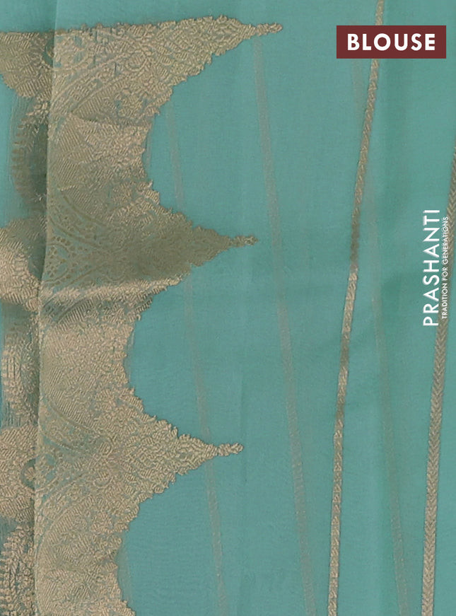 Banarasi organza silk saree teal blue with zari woven buttas and zari woven border