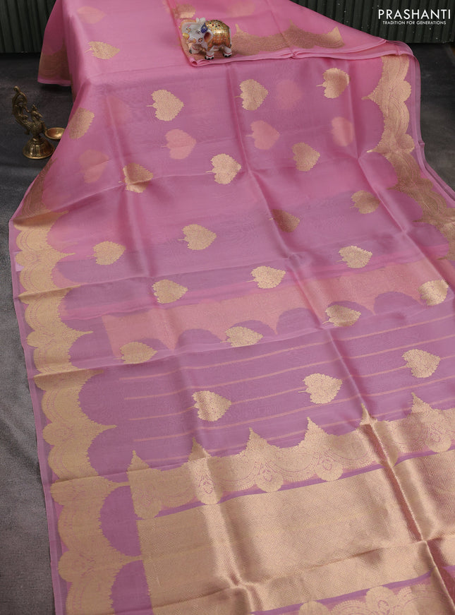 Banarasi organza silk saree peach pink with zari woven buttas and zari woven border
