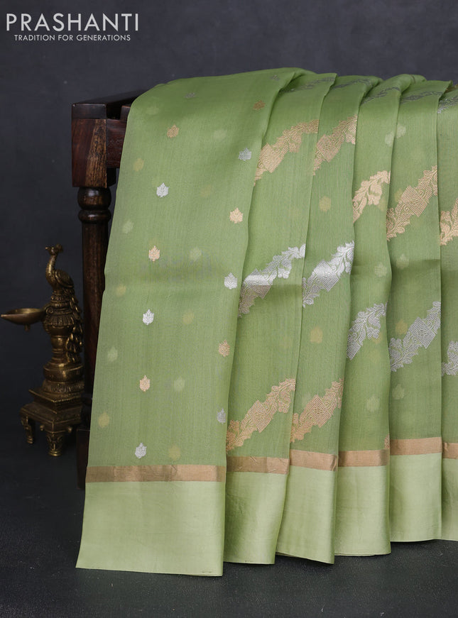 Banarasi organza silk saree pista green with allover silver & gold zari weaves and zari woven simple border