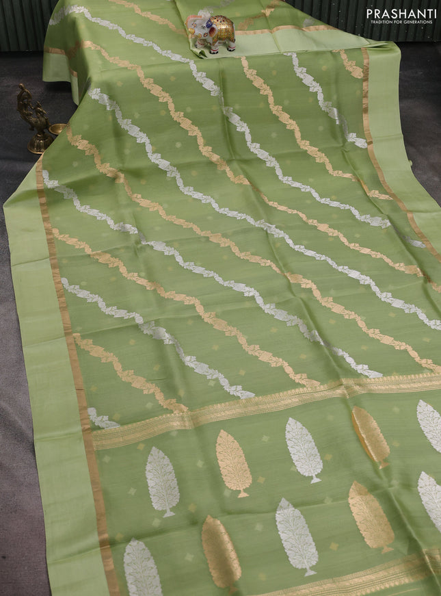 Banarasi organza silk saree pista green with allover silver & gold zari weaves and zari woven simple border