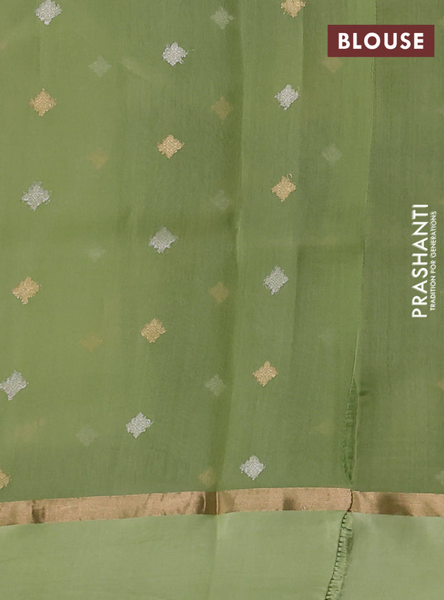 Banarasi organza silk saree pista green with allover silver & gold zari weaves and zari woven simple border