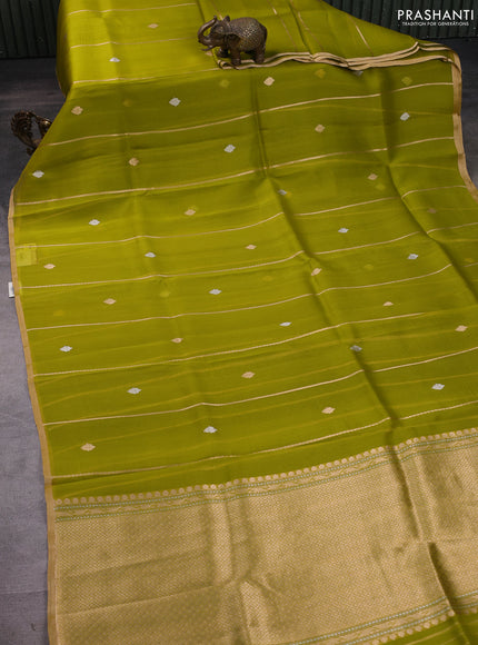 Banarasi organza silk saree lime green with allover zari stripes pattern & butas and zari woven border