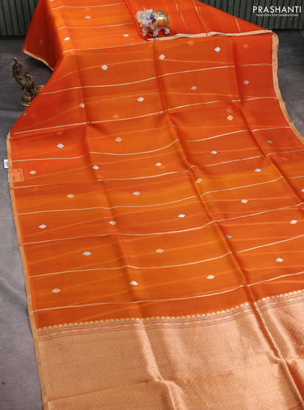 Banarasi organza silk saree orange with allover zari stripes pattern & butas and zari woven border