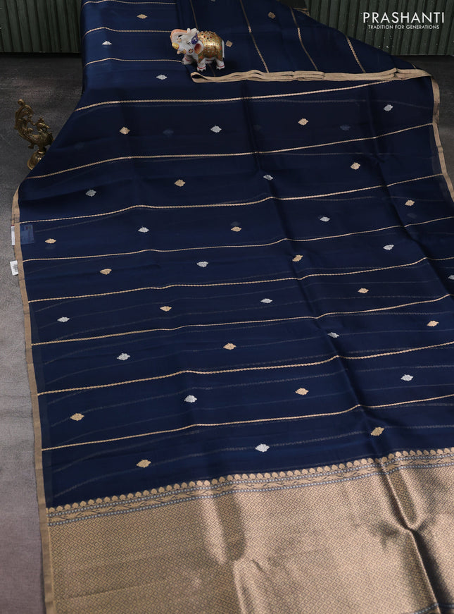 Banarasi organza silk saree peacock green with allover zari stripes pattern & butas and zari woven border