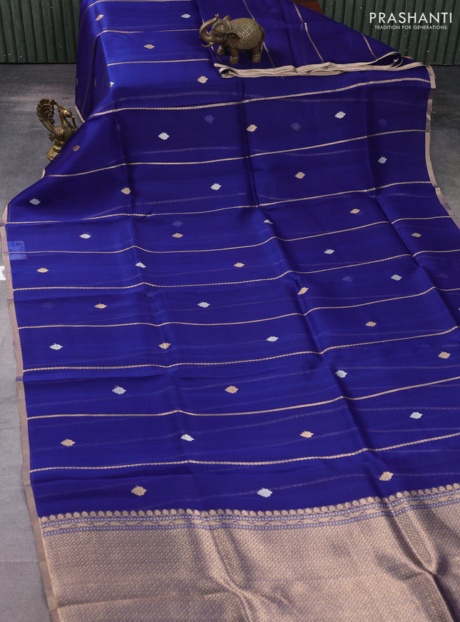 Banarasi organza silk saree navy blue with allover zari stripes pattern & butas and zari woven border