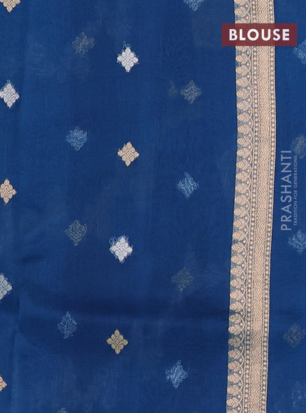 Banarasi organza silk saree peacock green with allover silver & gold zari weaves and simple border