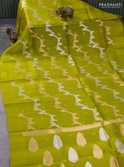 Banarasi organza silk saree light green with allover silver & gold zari weaves and simple border