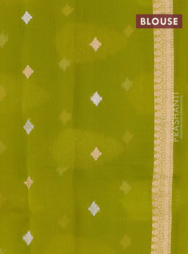 Banarasi organza silk saree light green with allover silver & gold zari weaves and simple border