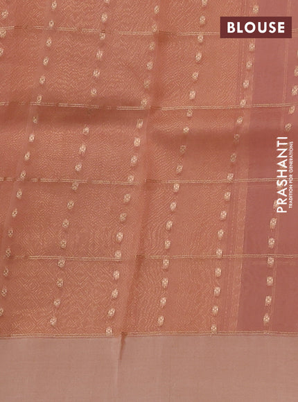 Banarasi organza silk saree peach orange with allover zari checks & buttas and simple border