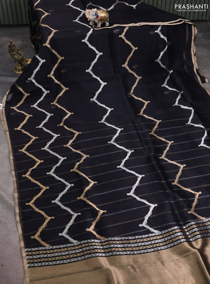 Banarasi organza silk saree black with allover silver & gold zig zag zari weaves and zari woven border