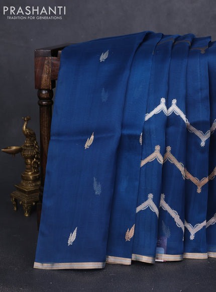 Banarasi organza silk saree peacock blue with allover silver & gold zig zag zari weaves and zari woven border