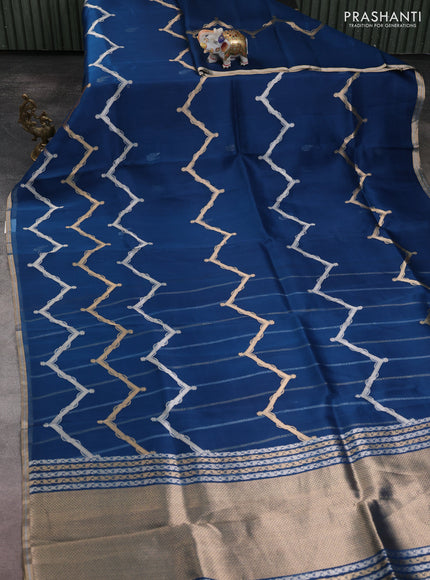 Banarasi organza silk saree peacock blue with allover silver & gold zig zag zari weaves and zari woven border