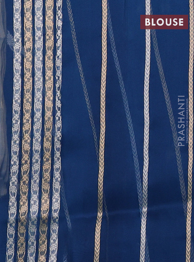 Banarasi organza silk saree peacock blue with allover silver & gold zig zag zari weaves and zari woven border