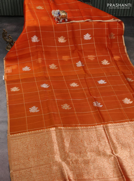 Banarasi organza silk saree orange with allover zari checks & buttas and zari woven border