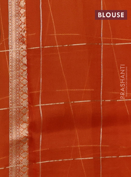 Banarasi organza silk saree orange with allover zari checks & buttas and zari woven border