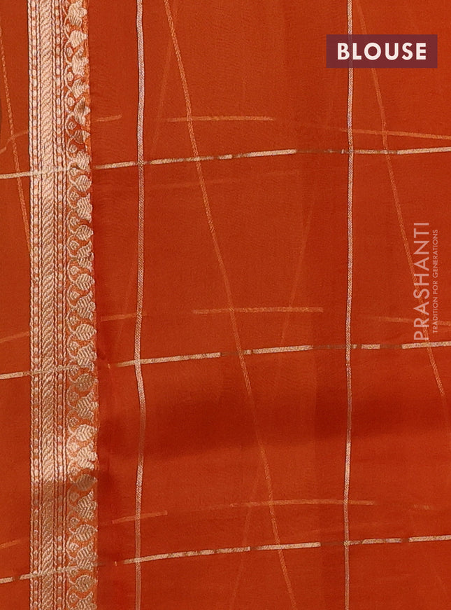 Banarasi organza silk saree orange with allover zari checks & buttas and zari woven border