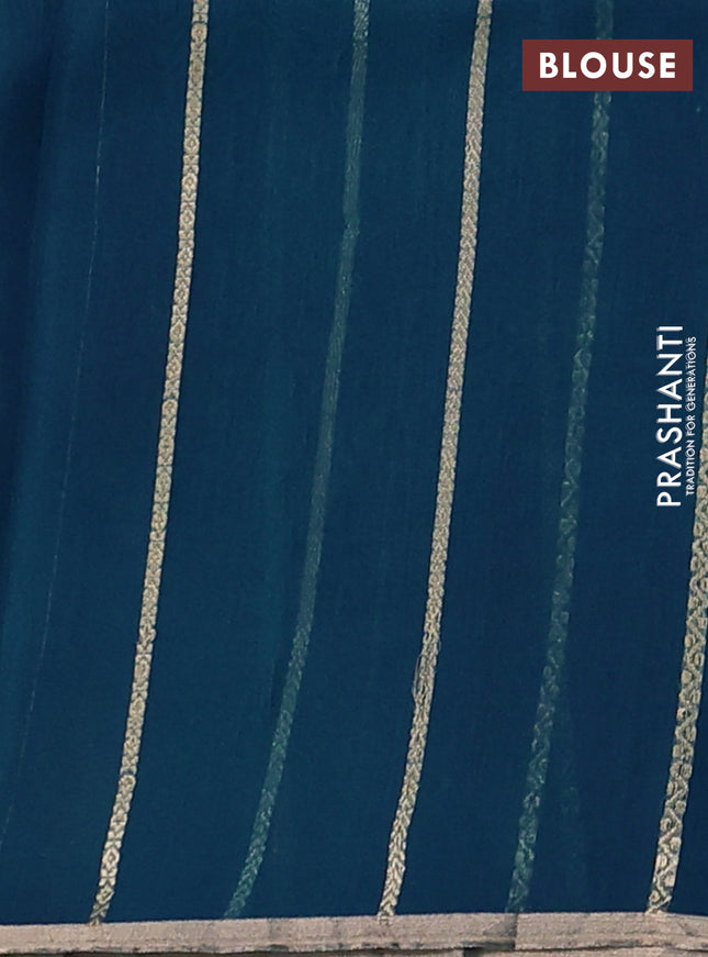 Banarasi organza silk saree peacock blue with allover silver & gold zari weaves and zari woven border