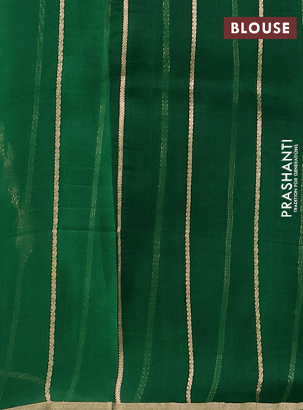 Banarasi organza silk saree green with allover silver & gold zari weaves and zari woven border