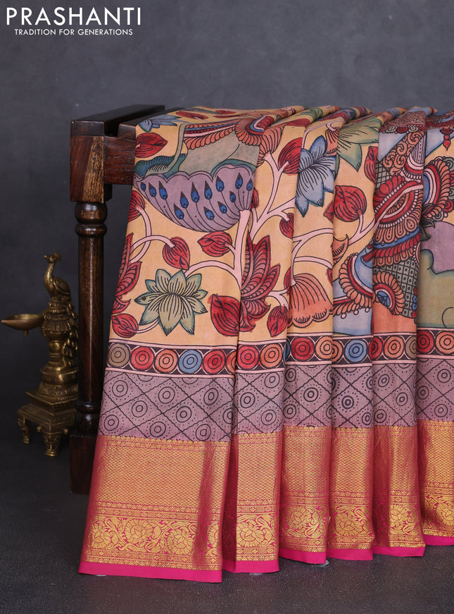 Pure kanchipuram silk saree pale orange and pink with allover penkalamkari prints and rich zari woven border