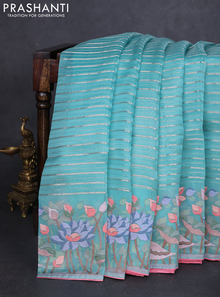 Pure organza silk saree teal green and peach pink with allover silver zari weaves and floral embroidery border