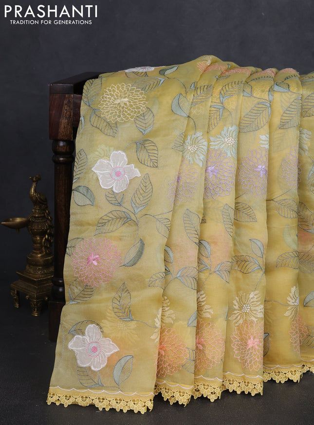 Pure organza silk saree pale yellow with allover applique work and lace work border