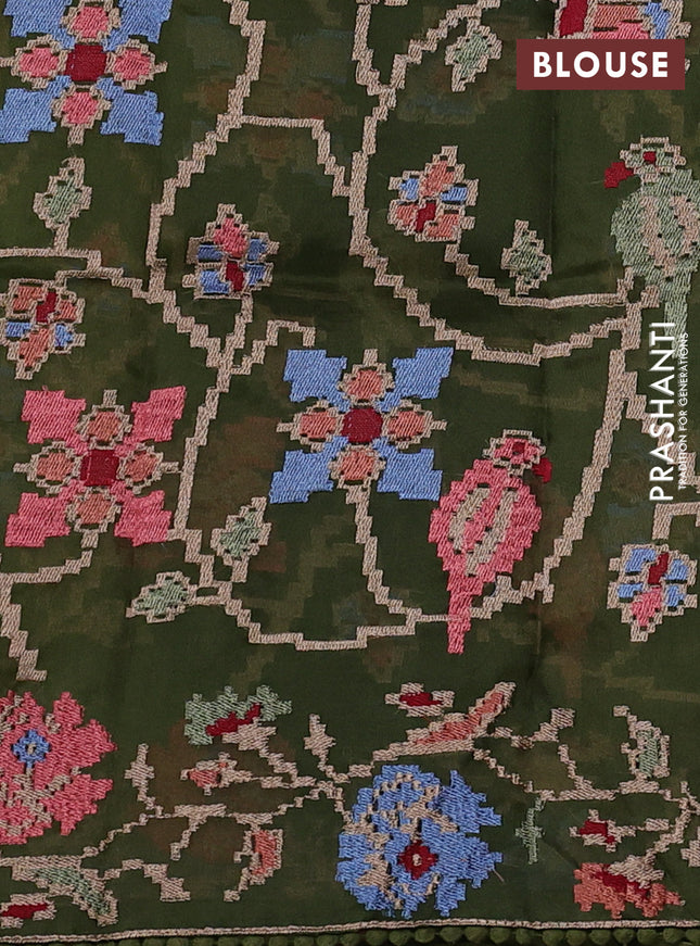 Pure organza silk saree sap green with plain body and floral embroidery border