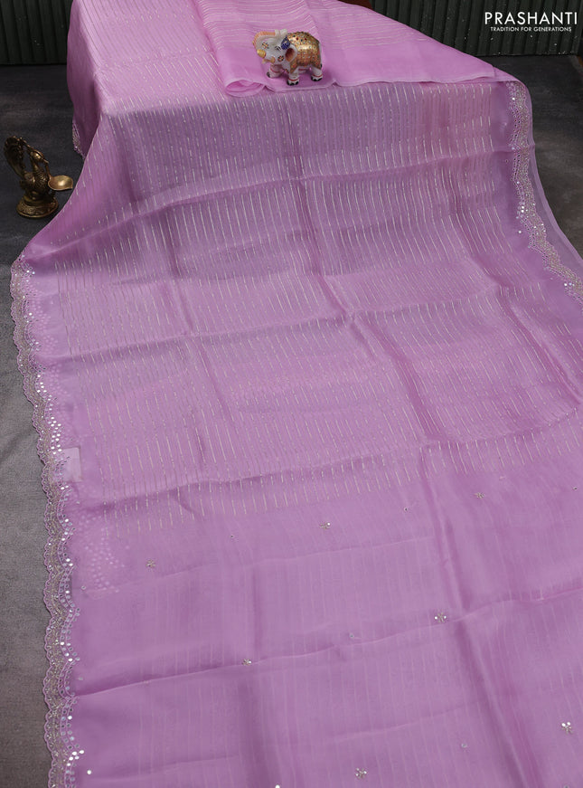 Pure organza silk saree mild lavender with allover zari weaves and sequin mirror work border