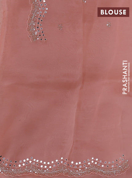 Pure organza silk saree peach orange with allover zari weaves and sequin mirror work border