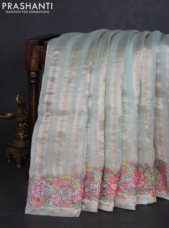 Pure organza silk saree pastel green with allover silver & zari stripes pattern and floral embroidery border
