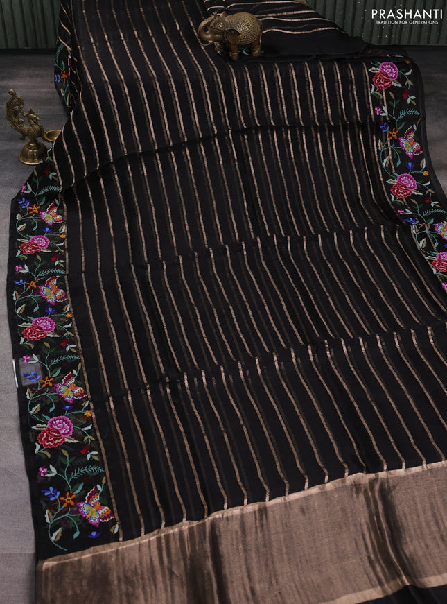 Pure organza silk saree black with allover zari weaves and floral embroidery border
