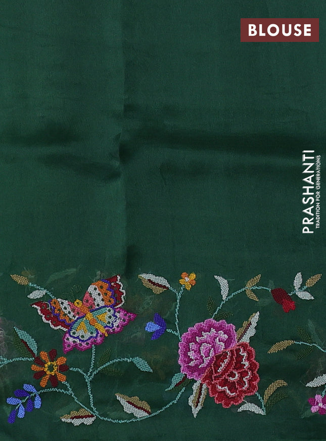 Pure organza silk saree bottle green with allover zari weaves and floral embroidery border