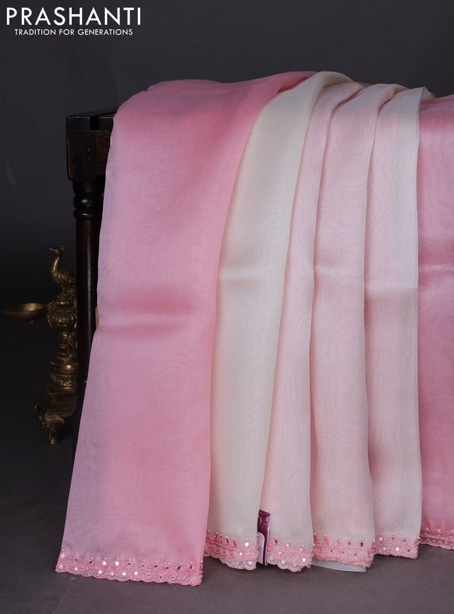 Pure organza silk saree peach pink and off white with plain body and embroidery mirror work border
