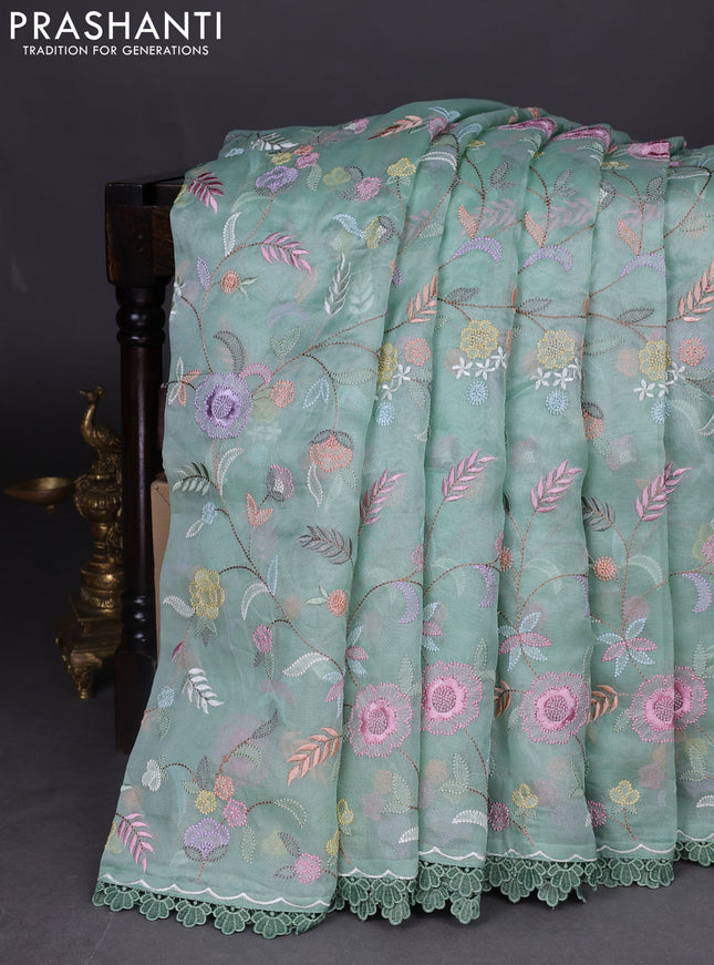 Pure organza silk saree pastel green with floral embroidery work and lace work border