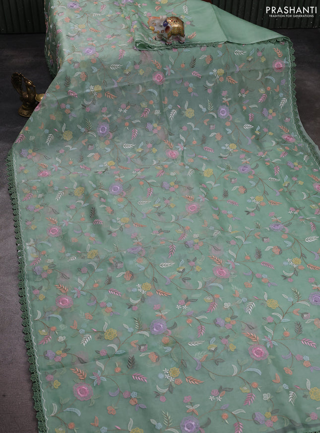 Pure organza silk saree pastel green with floral embroidery work and lace work border