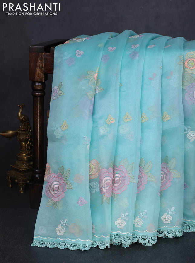 Pure organza silk saree teal blue with floral embroidery work and lace work border