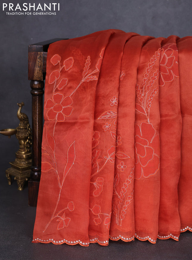 Pure organza silk saree rust shade with floral embroidery work and scalp border