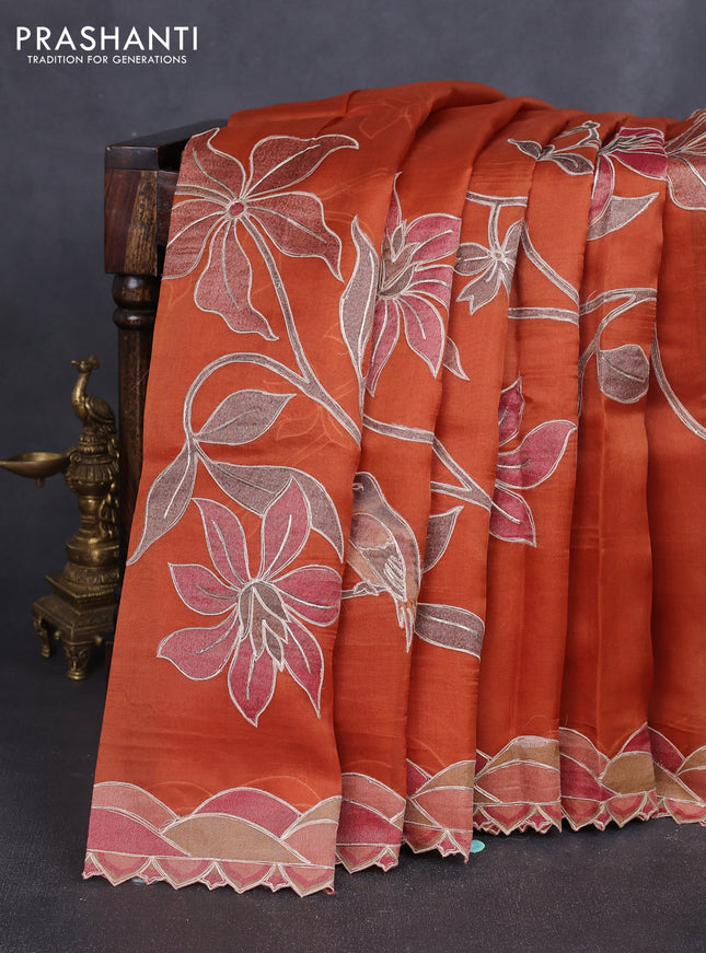 Pure organza silk saree rust shade with prints & pita work