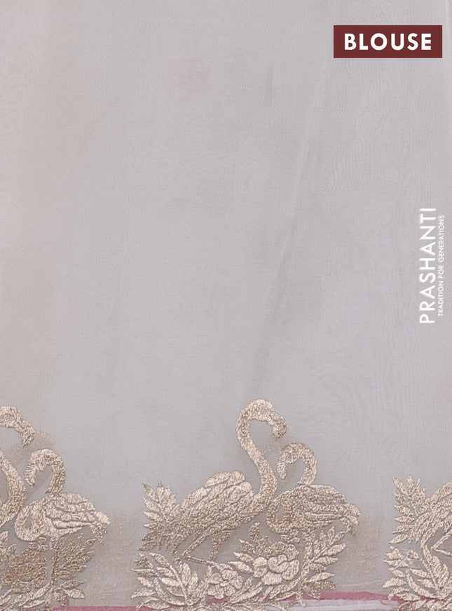 Pure organza silk saree off white and red with allover embroidery work and embroidery butta border