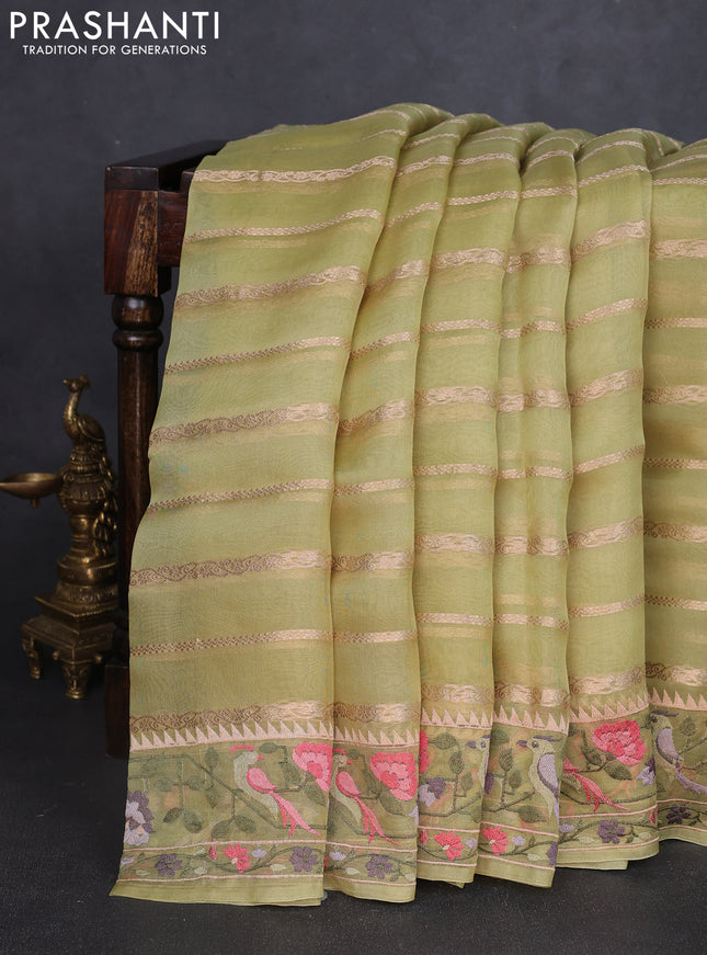 Pure organza silk saree pista green with allover zari weaves and floral embroidery border
