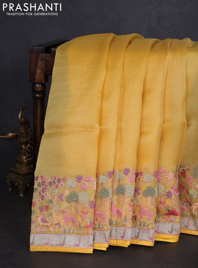Pure organza silk saree yellow with plain body and embroidery work border
