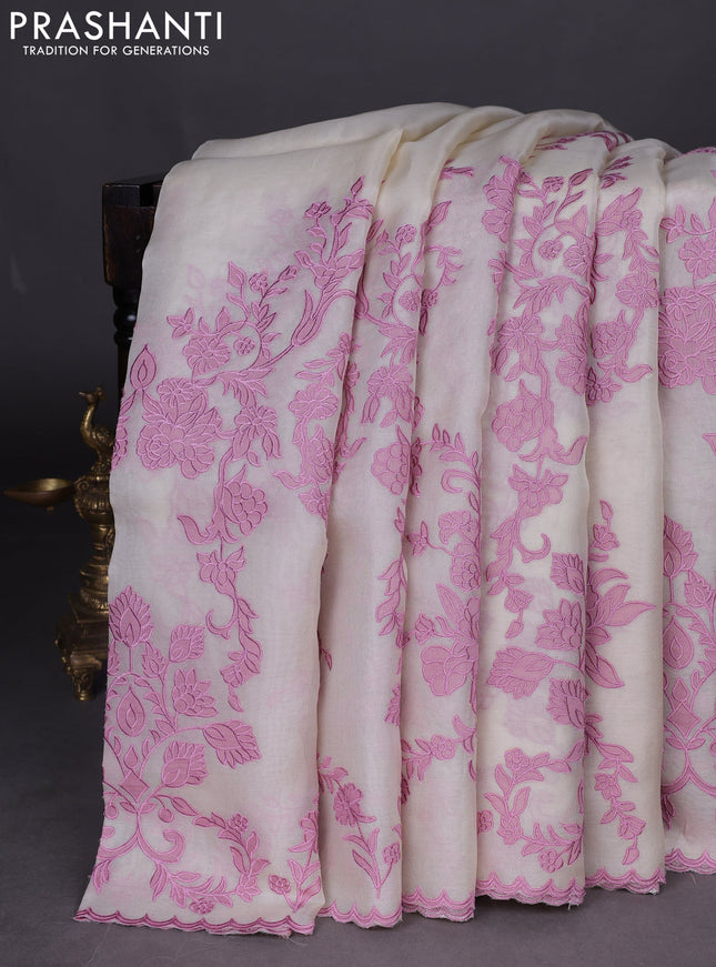 Pure organza silk saree cream and pink with allover appliqe work and scalap border