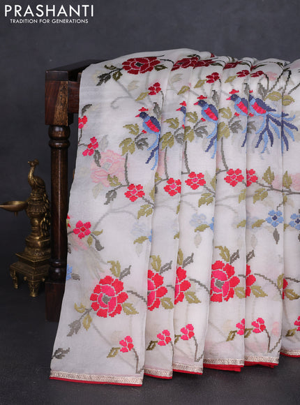 Pure organza silk saree off white and red with allover embroidery work and zari piping border
