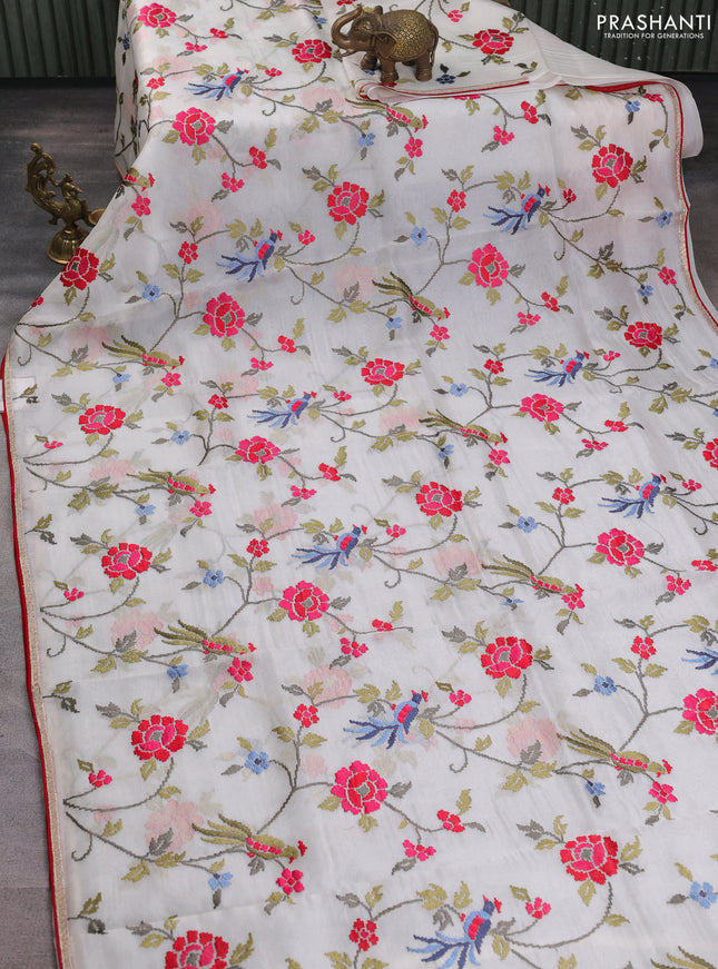 Pure organza silk saree off white and red with allover embroidery work and zari piping border