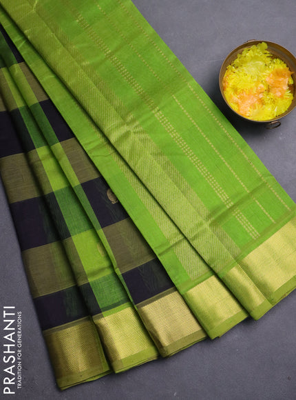 Silk cotton saree black and light green with allover paalum pazhamum checks & buttas and zari woven border