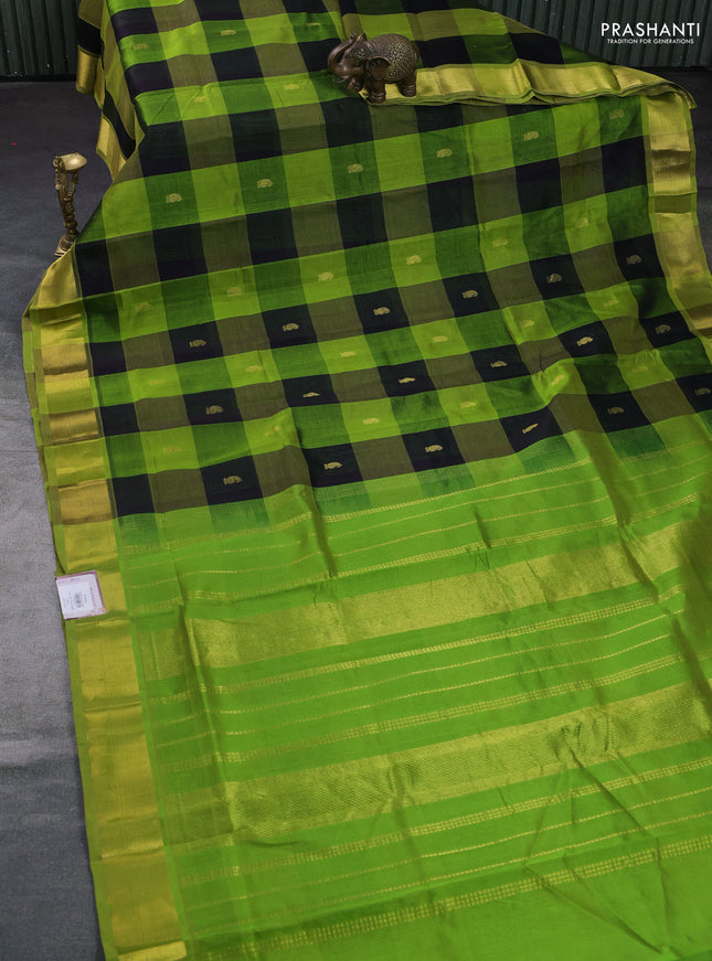 Silk cotton saree black and light green with allover paalum pazhamum checks & buttas and zari woven border