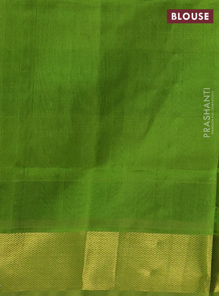 Silk cotton saree black and light green with allover paalum pazhamum checks & buttas and zari woven border