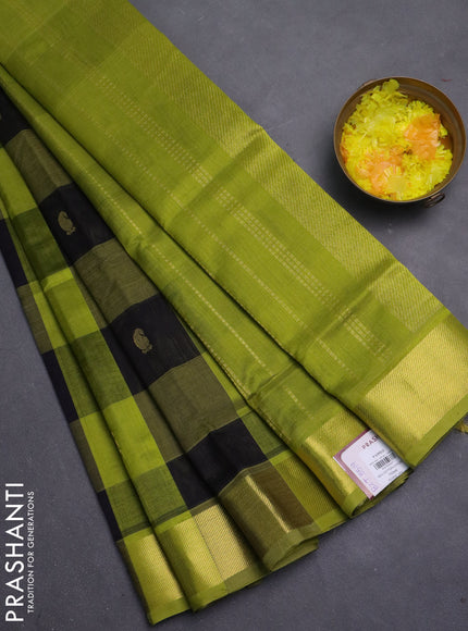 Silk cotton saree lime green and black with allover paalum pazhamum checks & buttas and zari woven border