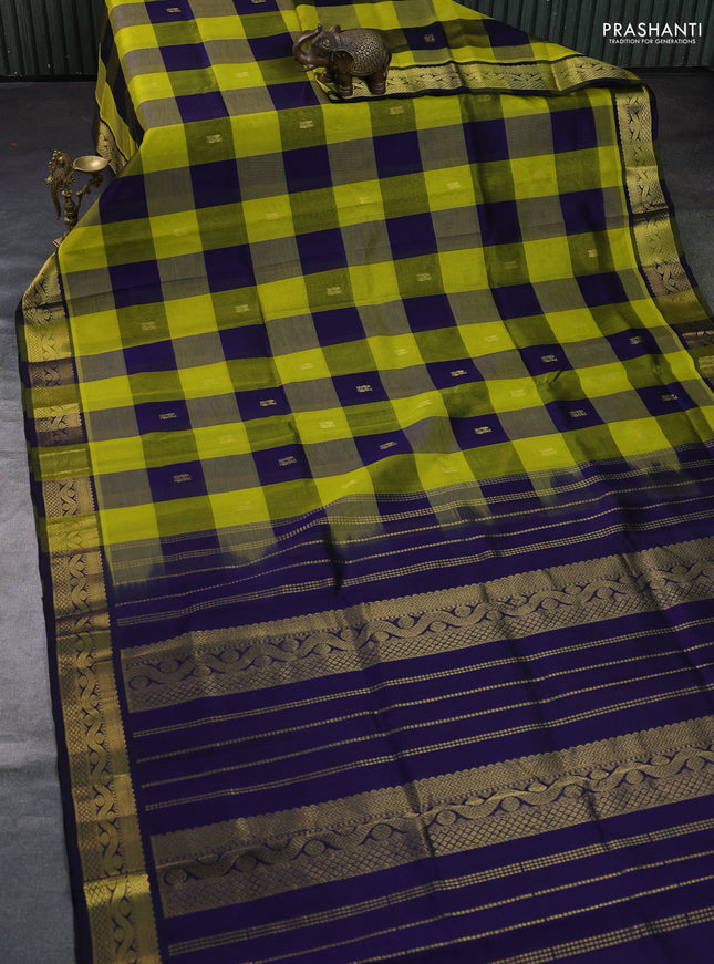 Silk cotton saree lime green and navy blue with allover paalum pazhamum checks & buttas and zari woven border