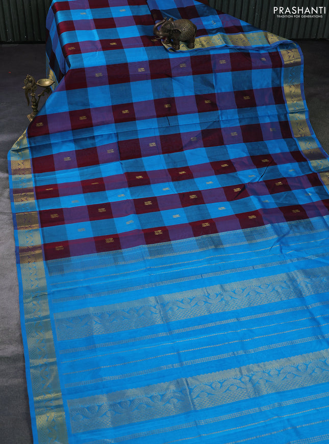 Silk cotton saree maroon and cs blue with allover paalum pazhamum checks & buttas and zari woven border